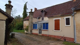 Maison de plain-pied et une grange  avec terrain Vierzon